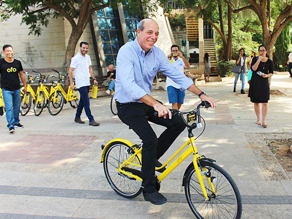 Pres Zaban rides Ofo bike at BIU